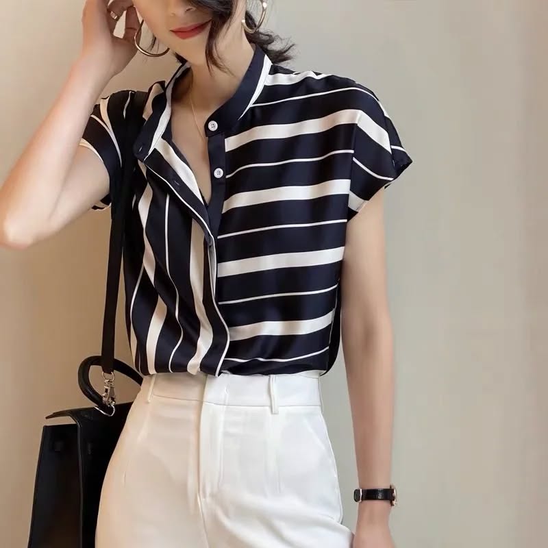 Takeer - Satin short sleeved blouses available 
Size:S-XL(UK 6-16)
Price:Tsh 35,000
