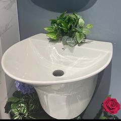 Takeer - Hand wash basin half pedestal
Price 150,000 complete with tap 
We located at kariakoo dsm
Call us 