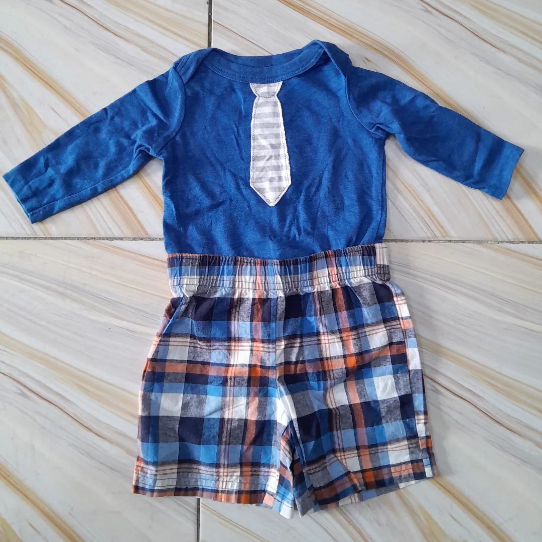 Takeer - Baby boy onesie and short
6 months
15,000 Tshs