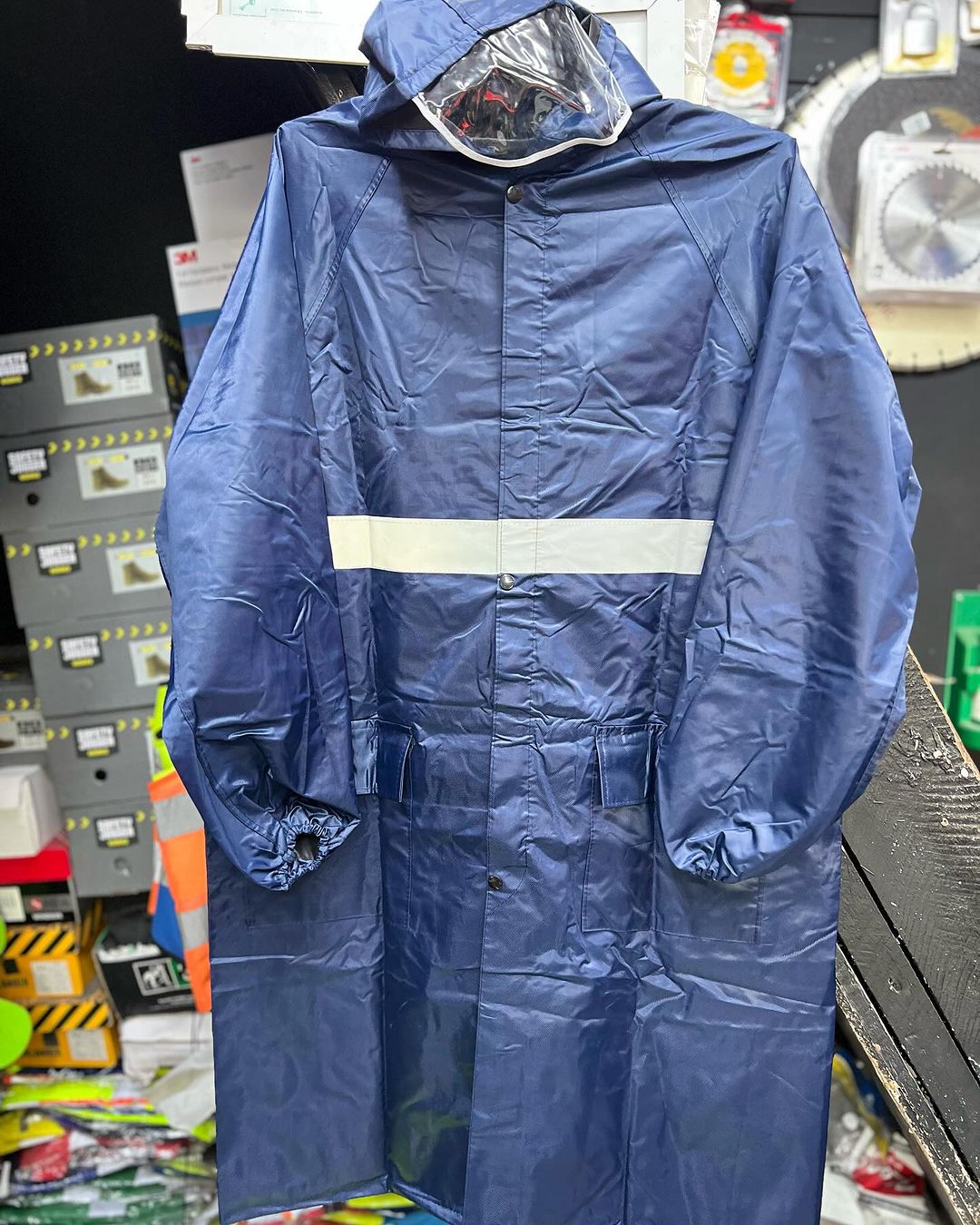 Takeer - 📌Rain coat with hood cap
📌For more details 
📌📱📍kamata near brt and railway gerezani terminal